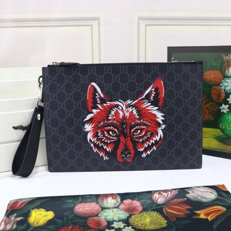 G*u*i clutch bags